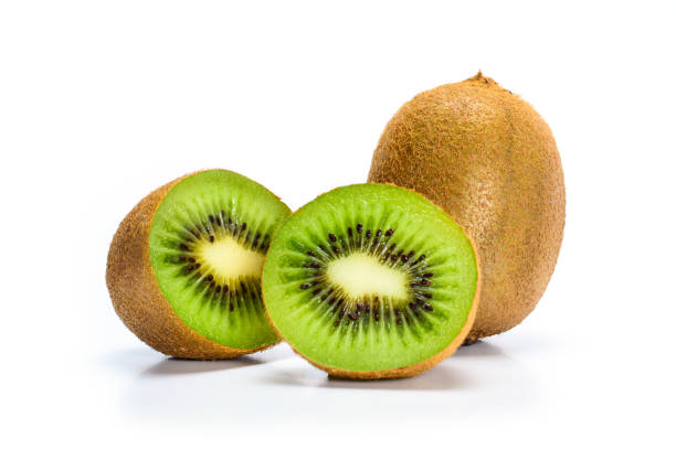 istock Kiwi fruit and one fruit cut in two halves, isolated on white background. Closeup macro. 1171530643