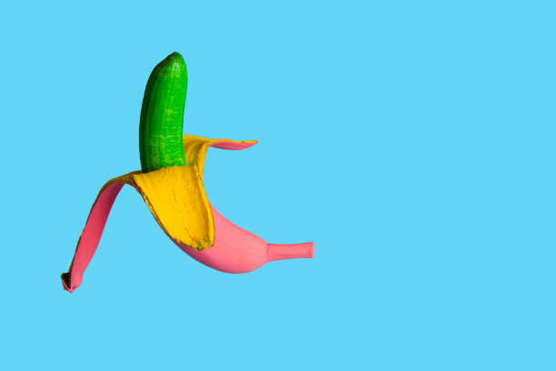 istock Decorated banana on a blue background 1171535466