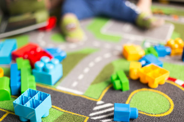 istock Cute one year old baby playing 1171537159