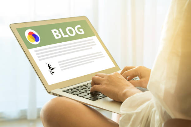 istock Women sit at work writing blog 1171537256