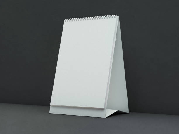 pusty kalendarz biurkowy na stole. koncepcja projektu makiety. 3d - spiral notebook zdjęcia i obrazy z banku zdjęć