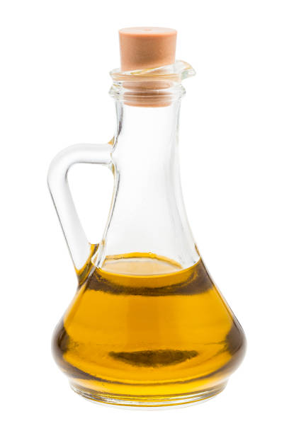 istock closed glass jug with olive oil isolated 1171538631