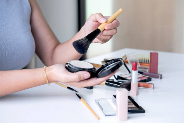 istock Elegant female Beauty blogger showing testing beauty cosmetic using product makeup tutorial cosmetics and sale product 1171554751