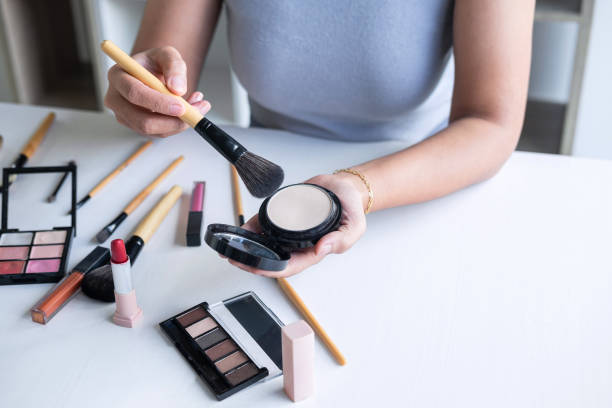 istock Elegant female Beauty blogger showing testing beauty cosmetic using product makeup tutorial cosmetics and sale product 1171554825