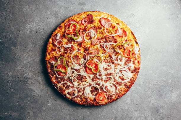 istock Flat lay of delicious pizza on gray background 1171560651