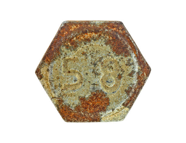 istock Rusty metal bolt head isolated on a white background 1171564877