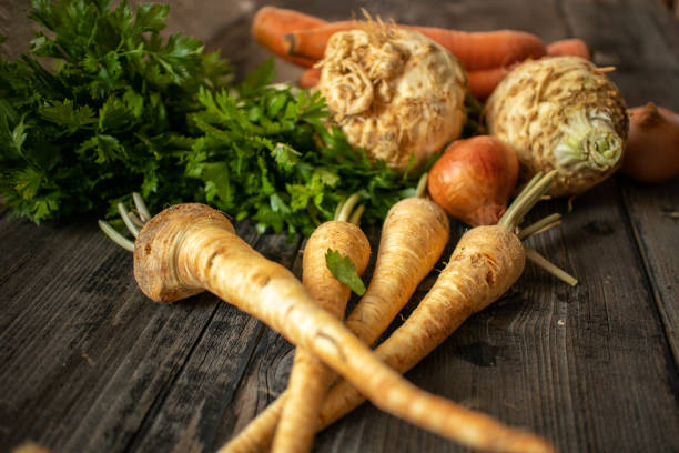 istock Various of different vegetables and spices on old wooden table. 1171566090