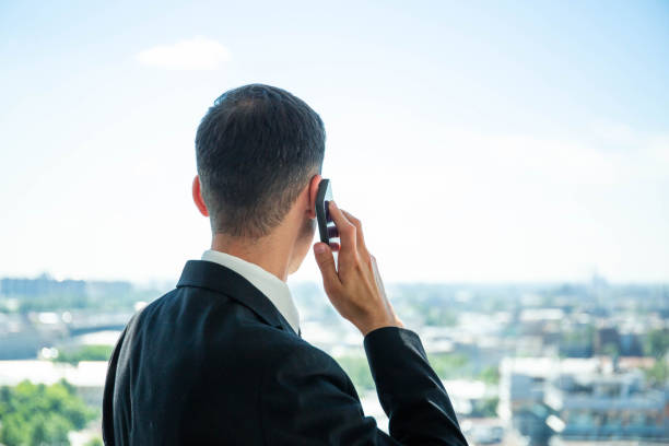 istock Business man calling by phone 1171569078