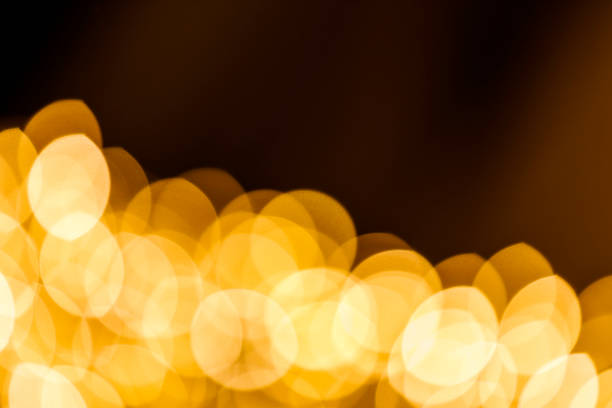 istock Blur background of gold color bokeh light 1171570324