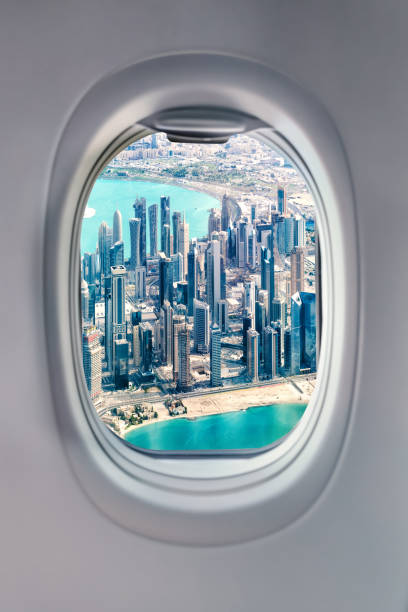 istock View from airplane window at Doha skyscrapers. 1171570406