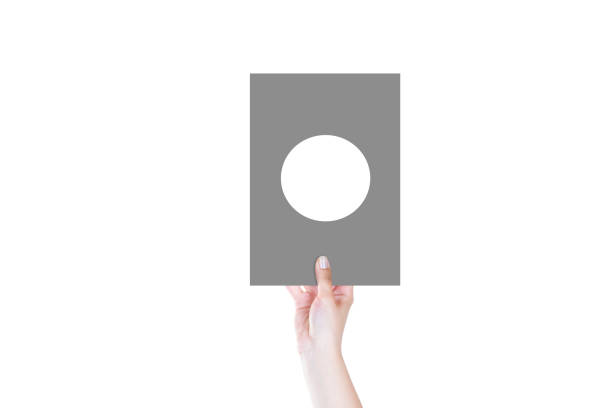 istock Female Hand is Holding An Empty Sign on Isolated White Background 1171570410