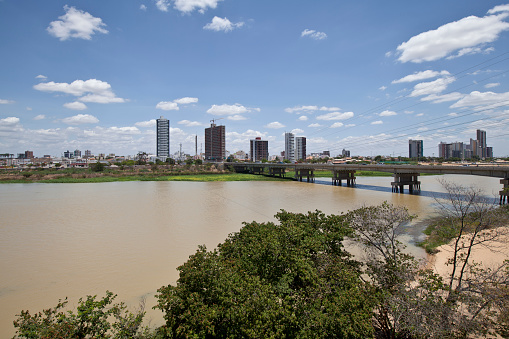 Petrolina, PE, Brazil - February 6th, 2017: São Francisco river near Petrolina and the bridge to Juazeiro, hinterland Pernambuco State, northeast Brazil.