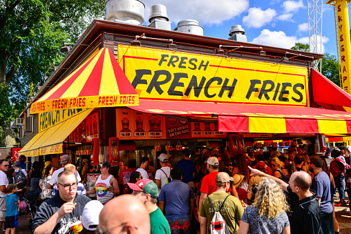 Falcon Heights, MN, USA. 08/24/2019: The Annual Minnesota State Fair, also known as Great Minnesota Get Together. State Fair French Fries Vendors