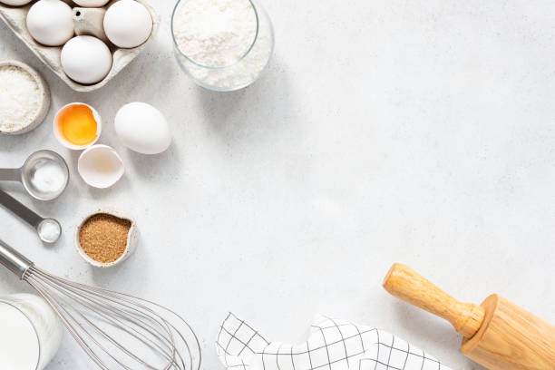 istock Cooking And Baking Ingredients Utensils On White Concrete Background 1171579778