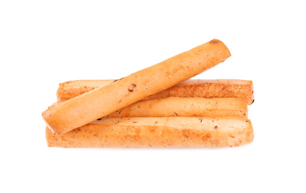 istock Bread sticks isolated on white background. Grissini, Italian breadsticks with onions and herbs. 1171580263