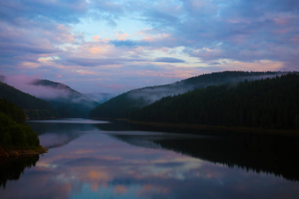istock Mountain landscape. beautiful mountain lake with reflection on the Sunset