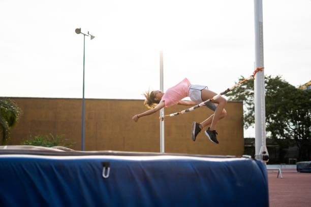 istock Female high jumper in mid-air 1171582732