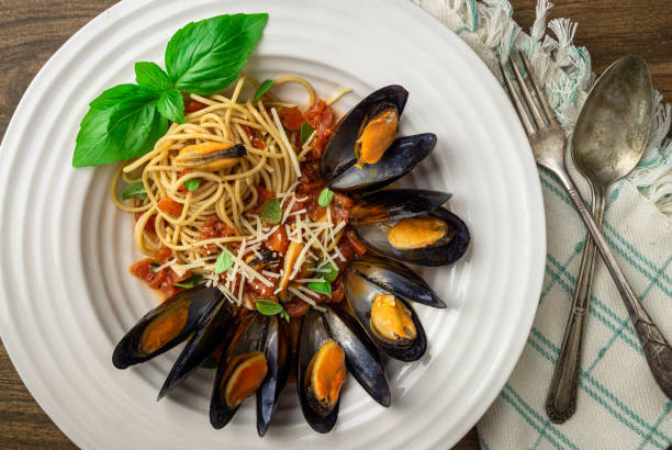 istock Mussels in garlic and wine sauce with pasta 1171582856