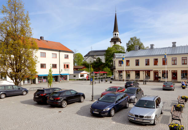 Mariefred Town Square Mariefred, Sweden - May 24, 2015: View of the Mariefred town square with parked car. mariefred stock pictures, royalty-free photos & images