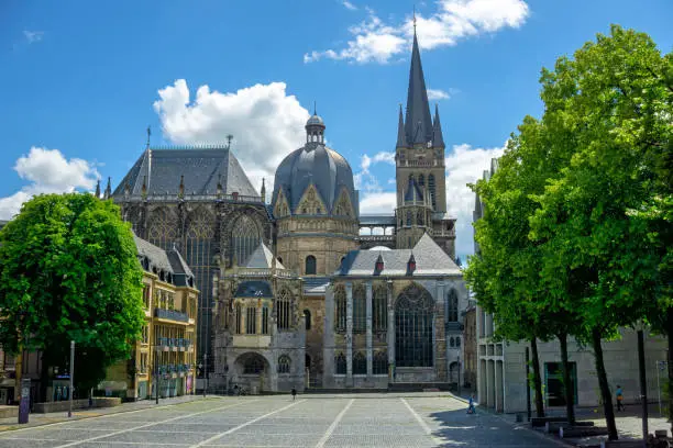 Huge gothic Aachen Dom Cathedral (Kaiserdom) in Aachen and blue sky in the background, Germany