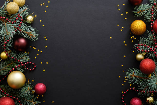 istock Black Christmas background with festive decorations, baubles, fir tree branches, confetti. Christmas holiday celebration, winter, New Year concept. Christmas banner mockup, greeting card template. 1171586248