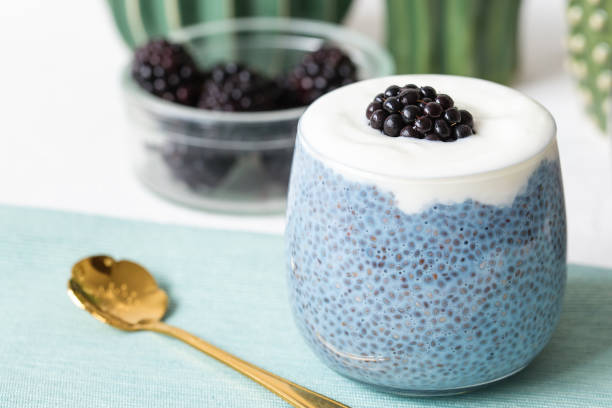 istock Blue chia seed pudding with blackberries in a glass 1171590843