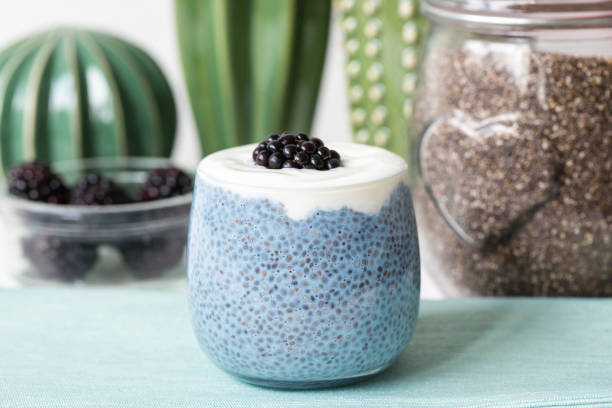 istock Blue chia seed pudding with blackberries in a glass 1171590862
