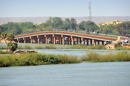 Niamey, Niger: JF Kennedy Bridge over the Niger River - elevated section over the western canal, where the river is navigable - Abdou Moumouni University in the background - called Djoliba in Mandingo