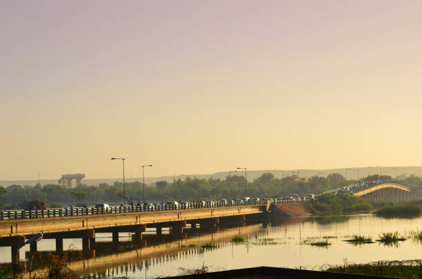 niger river - jf kennedy bridge at sunset, niamey, niger - niger river imagens e fotografias de stock