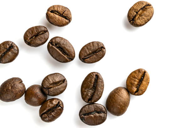 istock Roasted coffee beans isolated in white background cutout. Coffee background or texture concept. 1171594644