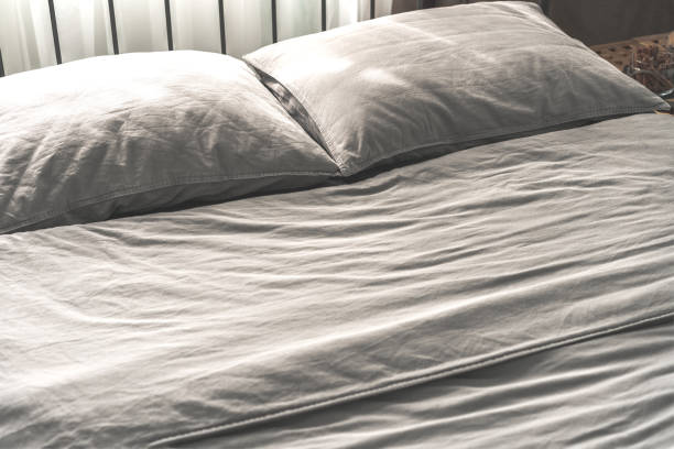 istock Cozy gray bedroom interior with comfortable bed 1171595466