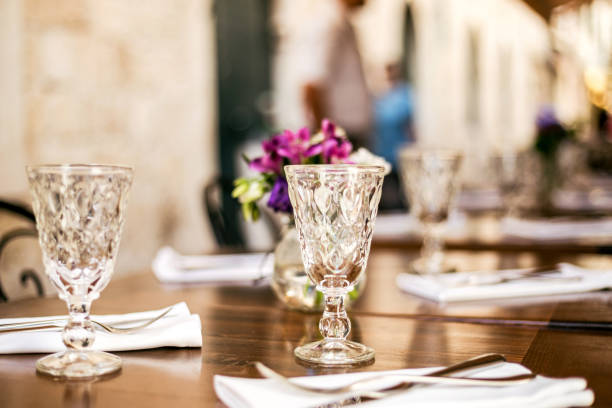 istock Vintage glasses table setting in a summer restaurant 1171599704