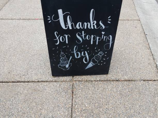 istock black thanks for stopping by sign with ice cream 1171600464
