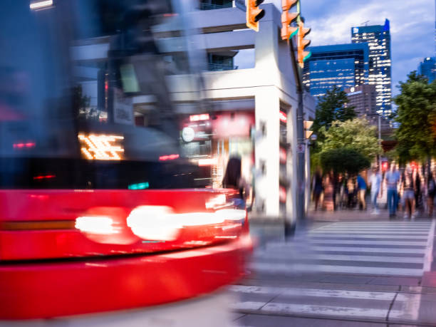 Downtown Toronto - Street Car (Public Transportation) Mass transit / public transportation in downtown Toronto. sustainable energy toronto stock pictures, royalty-free photos & images