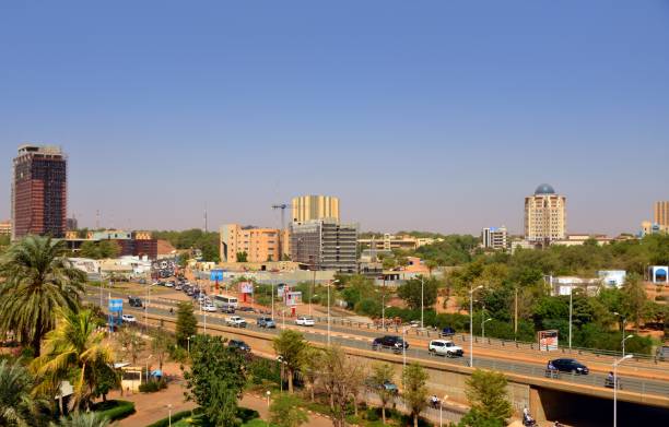 Niamey skyline from François Mitterrand avenue, Niger Niamey, Niger: ciity skyline from François Mitterrand avenue - Radisson Blue, Sonidep, BCEAO, Noom Hotel, Euro World, WAQF tower, BDRN building... african currency stock pictures, royalty-free photos & images