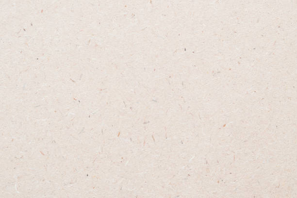 tablero de partículas, fondo de aglomeca con textura granulada de prensas de partículas panel de madera u osb tablero de hilo orientado en color crema marrón beige claro sepia - chipboard fotografías e imágenes de stock