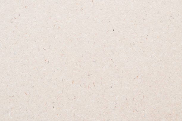 particleboard, chipboard background with grainy texture of particle presses wooden panel or osb oriented strand board in light beige brown cream sepia color - plate changing imagens e fotografias de stock