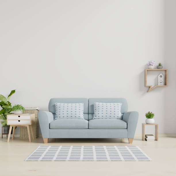 istock Modern living room interior with sofa and green plants,lamp,table on white wall background. 1171619287