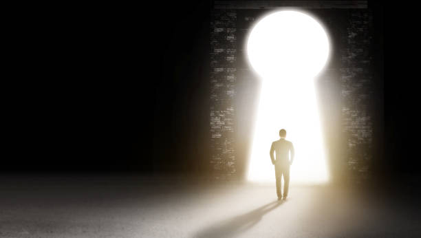 istock Businessman walk  in dark room looking outside 1171622166