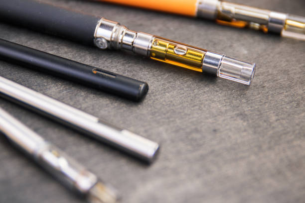 istock THC:CBD Extract Oil In Vape Pens Up Close 1171628821