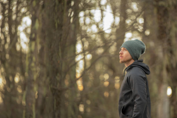 istock Side view of a man in the forest 1171628988