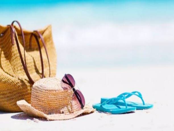 istock Creative seabeach scenery with hat,sunglass,slippers and bag with white background 1171632770