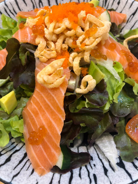 istock A delicious salmon with vegetables salad on plate 1171635061