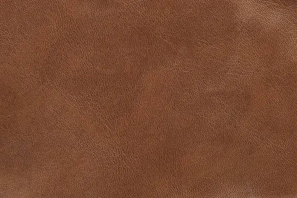 Photo of Brand new brown leather that looks smooth 