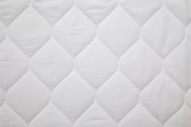 istock close up of white mattress bedding pattern background 1171639350