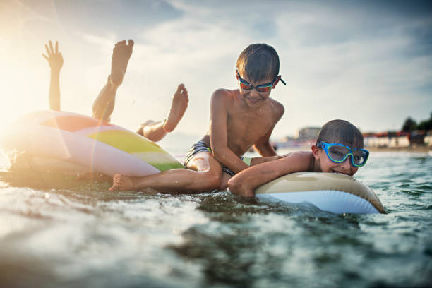 istock Kids enjoying summer vacations 1171639580