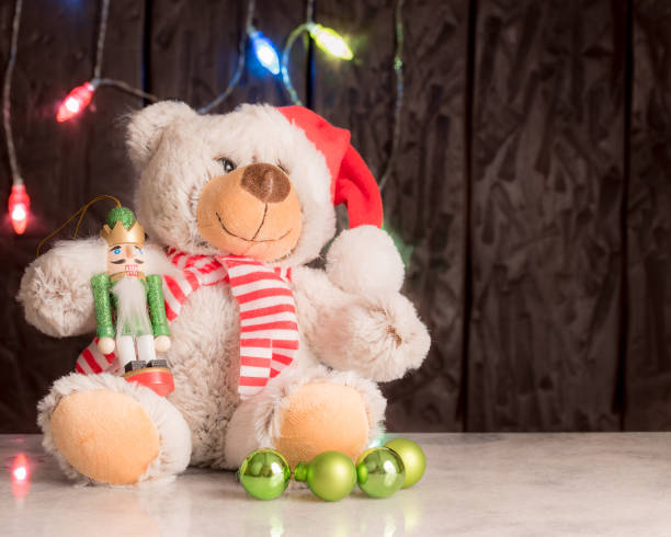 istock cute teddy bear for christmas signs 1171640231