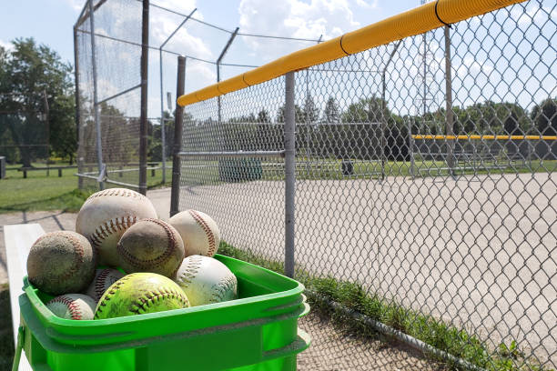Baseball balls stored in bucket ideal for training season or coaching baseball