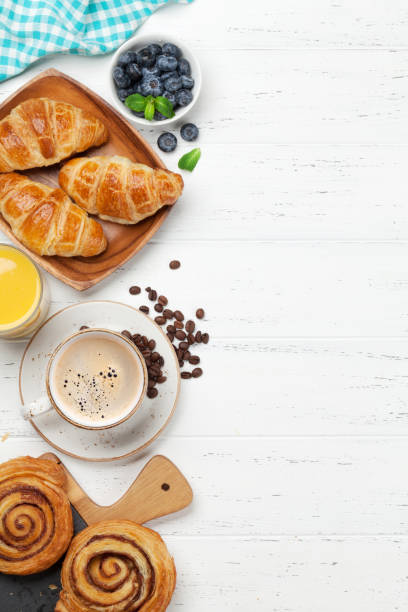 istock Coffee, juice and croissants breakfast 1171641598