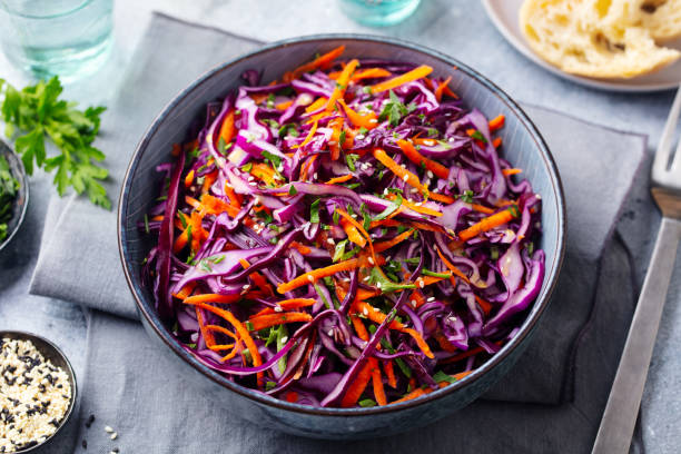 istock Red cabbage salad. Coleslaw in a bowl. Grey background. Close up. 1171643732